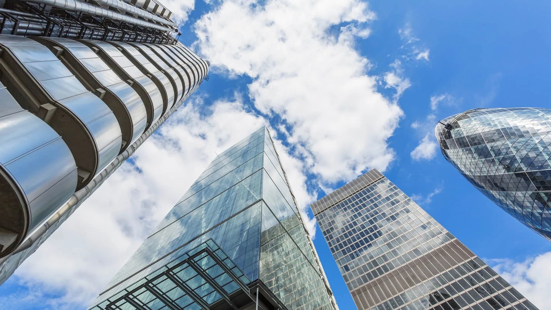Glass office towers seen from below